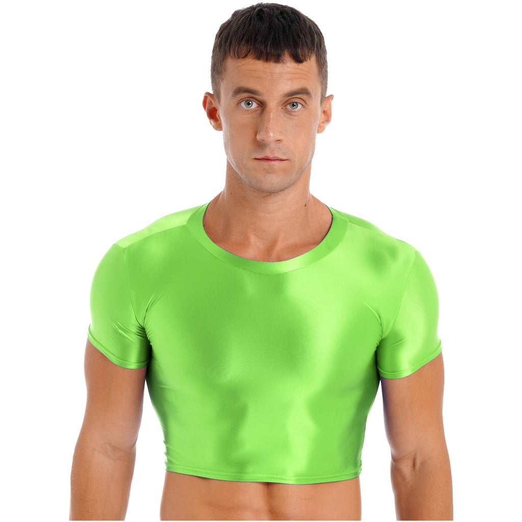 Front-facing model wearing a bright neon-green fitted short-sleeve crop top on white