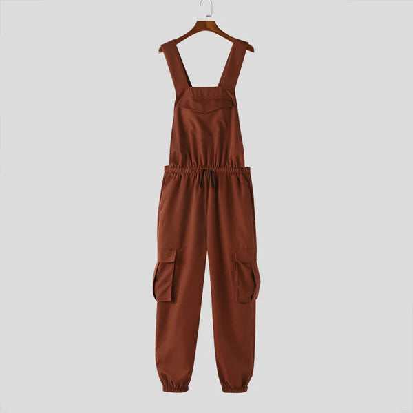Front view of rust-brown cargo overalls with adjustable shoulder straps and multiple pockets