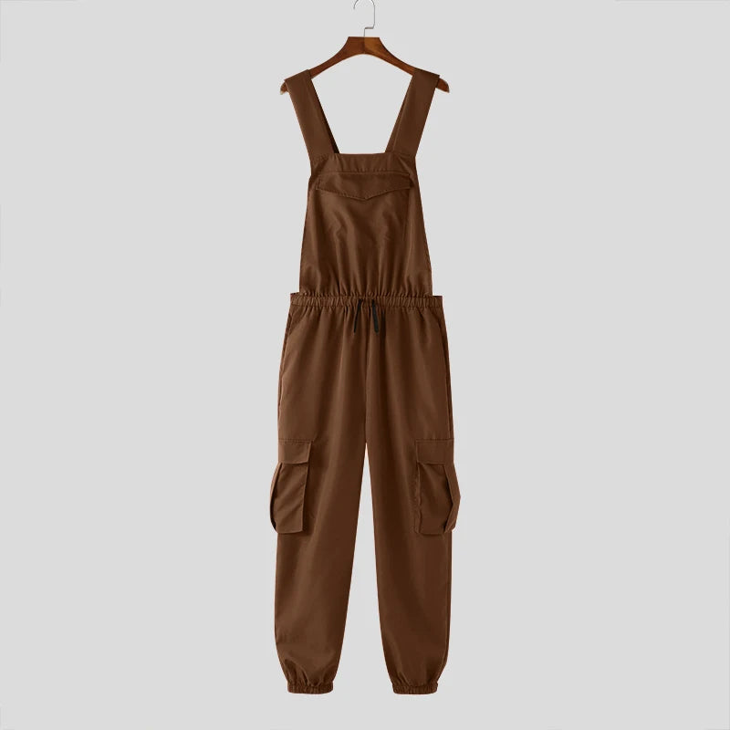 Brown cargo overalls with adjustable shoulder straps, drawstring waist, and large utility pockets