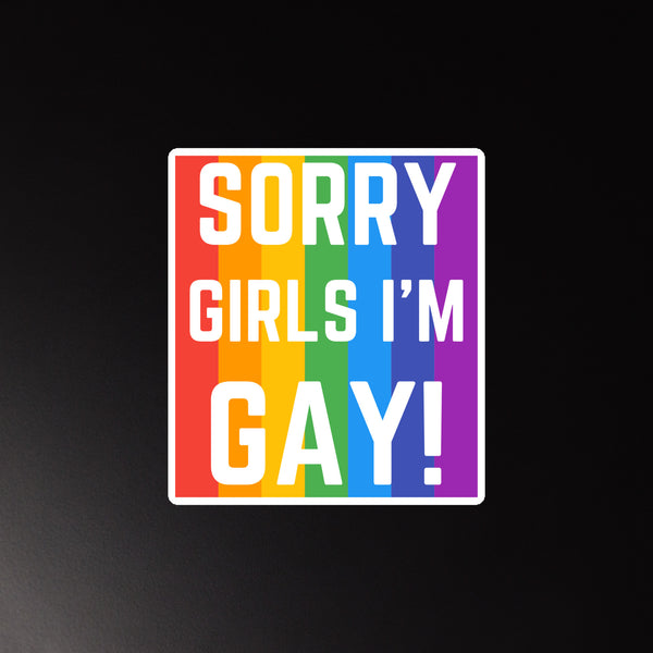 Square rainbow-striped magnet reading “SORRY GIRLS I’M GAY!”