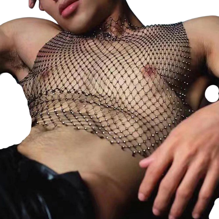 Close-up of a person wearing a black rhinestone fishnet vest with exposed chest