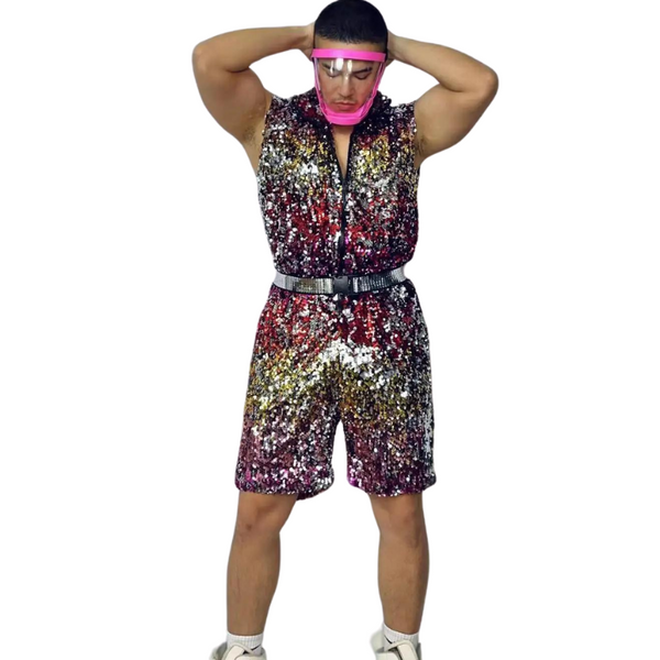 Front-view model wearing a multicolored sequin romper with shorts and a black belt