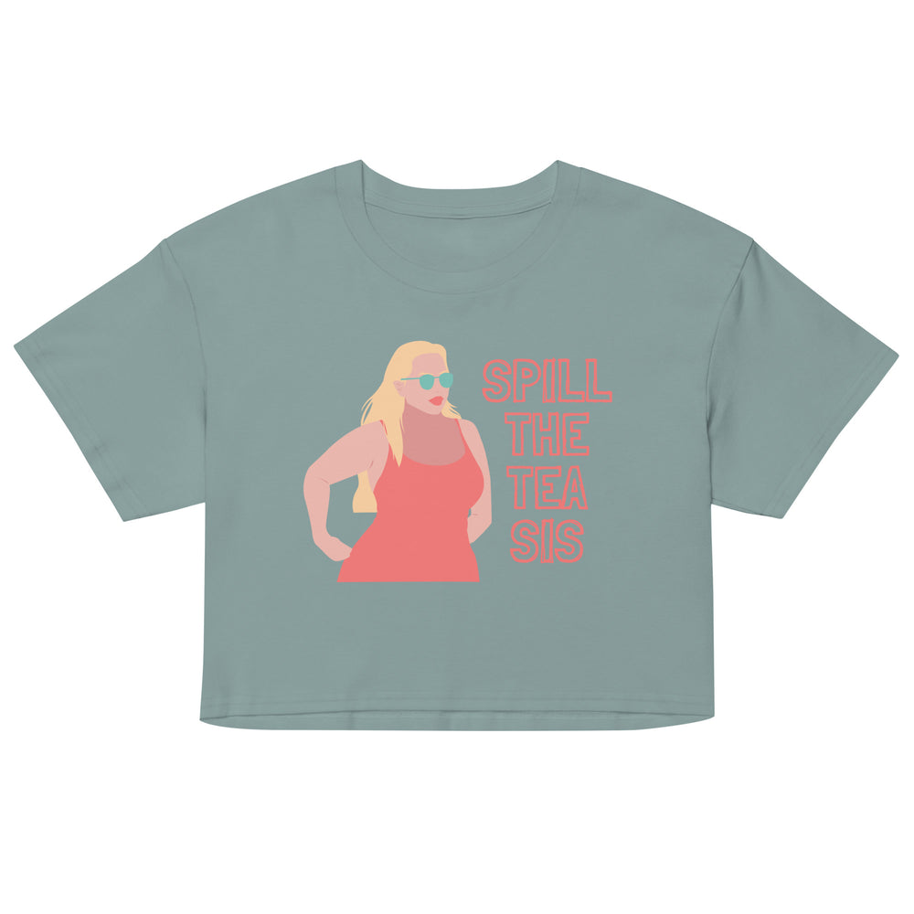 Front view of a sage green crop top reading “SPILL THE TEA SIS” with a sunglasses-wearing woman graphic