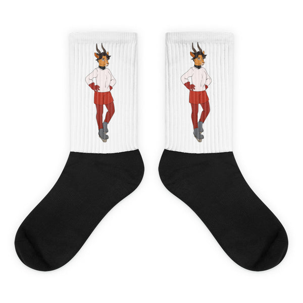 Pair of black-and-white socks with matching horned character illustrations on the white cuffs