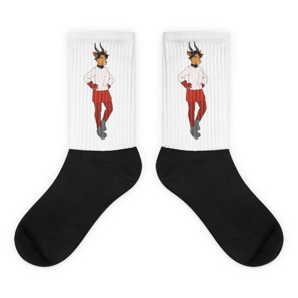 Pair of black-and-white socks with matching horned character illustrations on the white cuffs