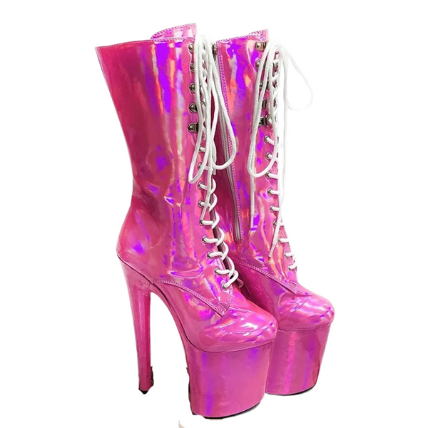 Pink holographic platform ankle boots with tall stiletto heels and white lace-up fronts