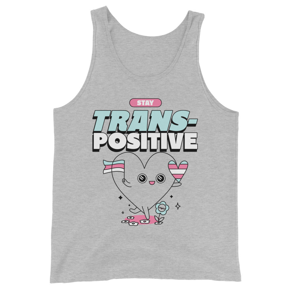 Unisex tank top with “STAY TRANS-POSITIVE” text, cartoon heart holding trans flags, pastel flowers, sparkles