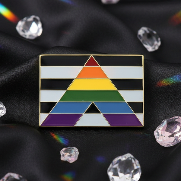 Straight Ally enamel pin with rainbow-striped triangle on black fabric