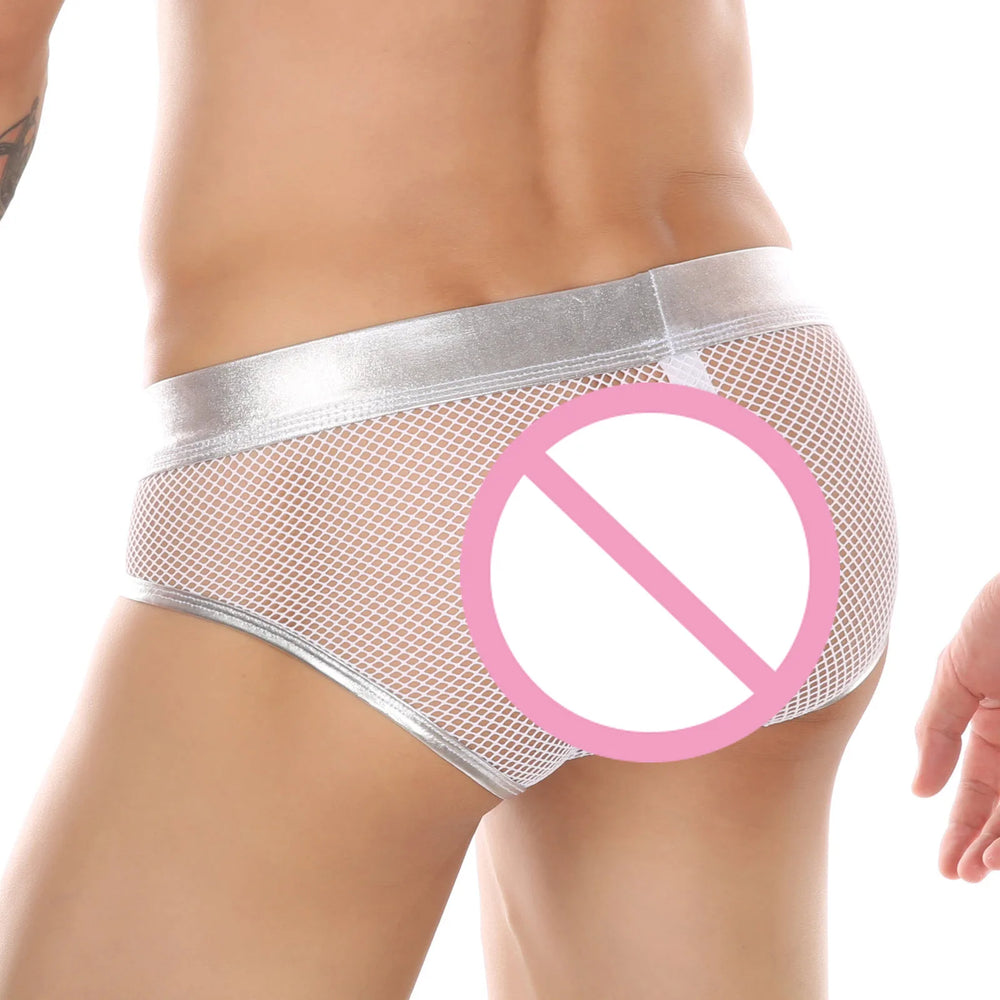 Rear three-quarter view of a model wearing silver mesh boxer briefs with pink censor symbol