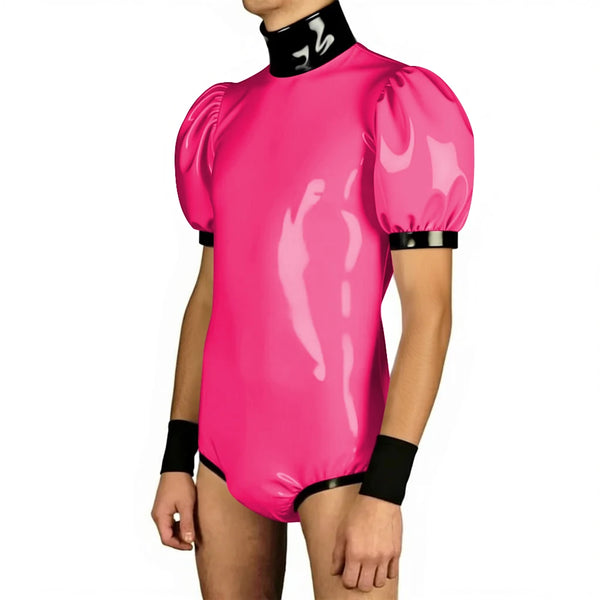 Front-facing model wearing a glossy pink PVC bodysuit with puff sleeves and black trim