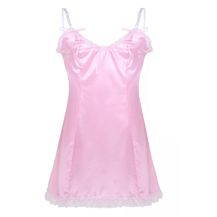 Front view of a pink satin slip dress with lace trim, bows, and frilled hem