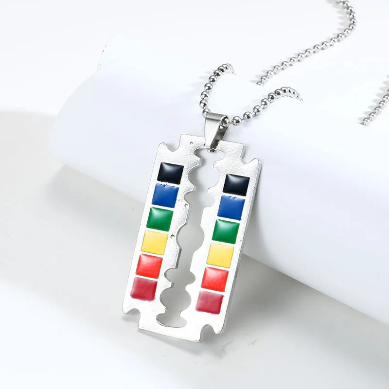 Rainbow razor blade pendant necklace on a silver ball chain
