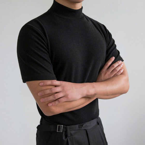 Cropped model wearing a fitted black short-sleeve high-collar T-shirt