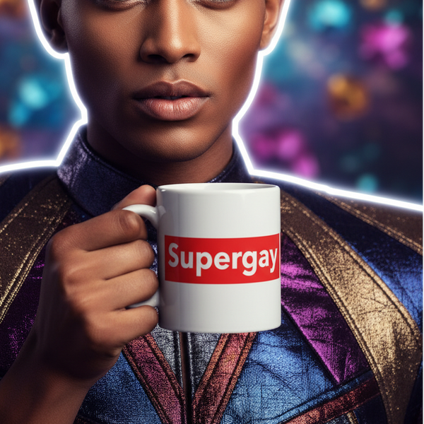 Person in a colorful superhero-style outfit holds a white “Supergay” mug