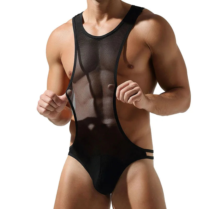 Front view of a muscular model wearing a sheer black mesh bodysuit with side straps