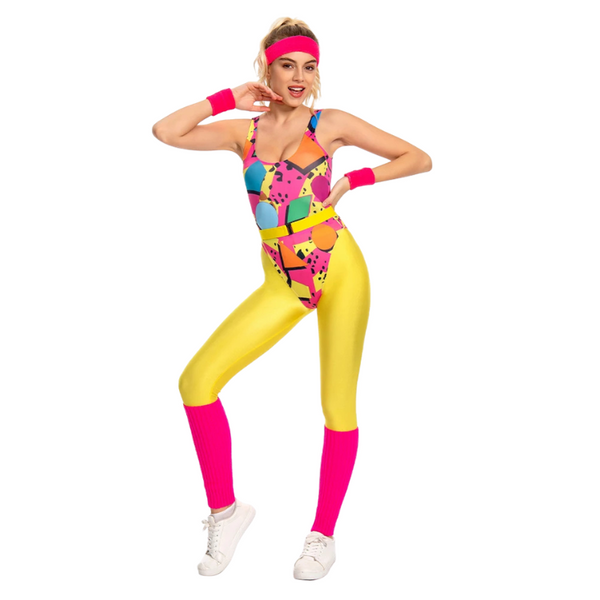 Front-facing model in a colorful geometric 1980s aerobics costume with yellow leggings and pink accessories