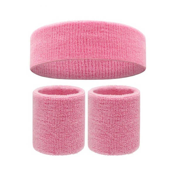Three-piece pink terry cloth fitness set with one wide headband and two wristbands