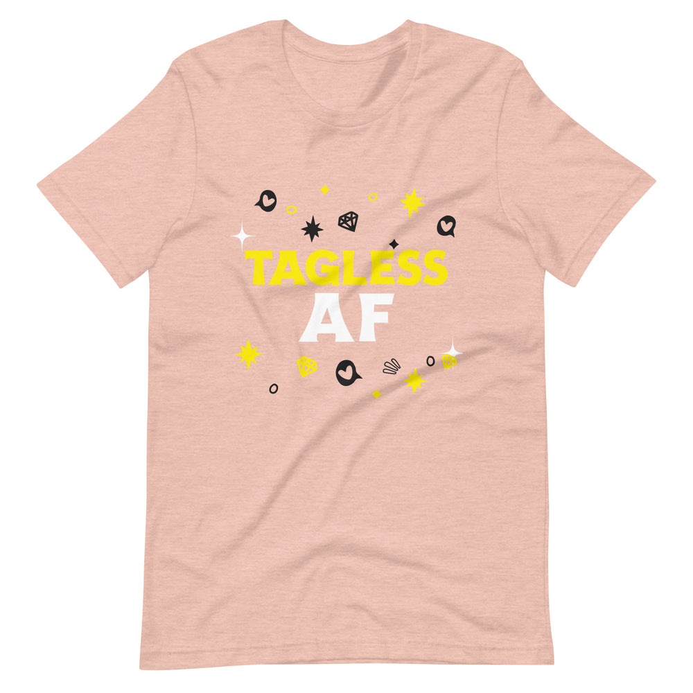 Light pink T-shirt with bold yellow and white "TAGLESS AF" lettering and playful black, white, and yellow queer doodles.