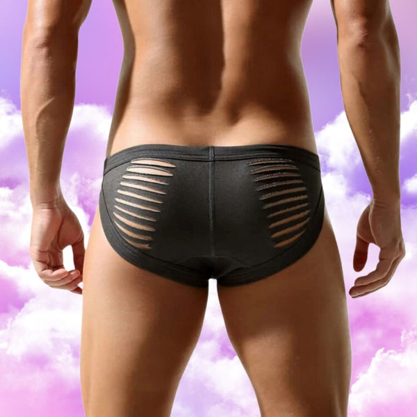 Rear view of a person wearing black low-rise briefs with horizontal side slits