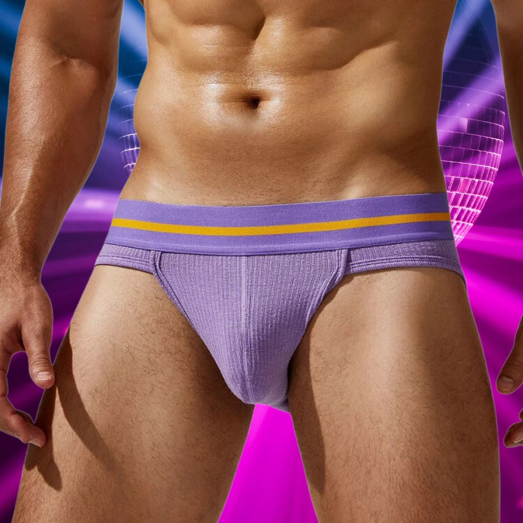 Front view of a model wearing ribbed lavender briefs with a purple waistband and yellow stripe