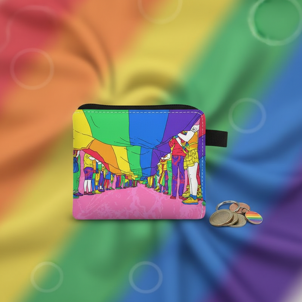 Rainbow Pride change purse with a colorful parade illustration, zipper top, and coins beside it