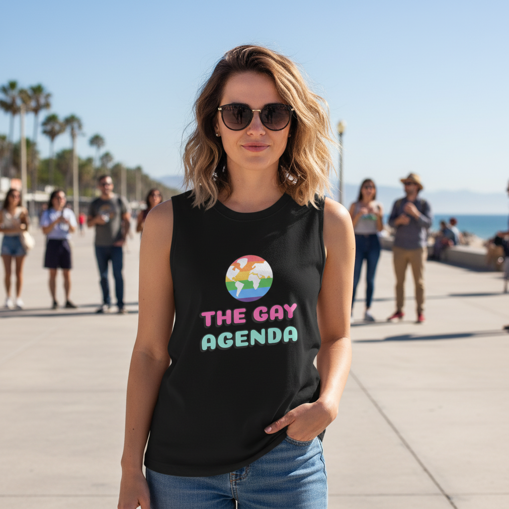 The Gay Agenda Muscle Top with a vibrant earth graphic worn by a person in sunglasses outdoors