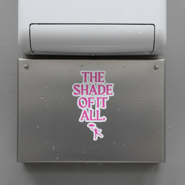 A metal hand dryer sports “The Shade Of It All” bubble-free sticker in fierce pink and white, with a small pink silhouette