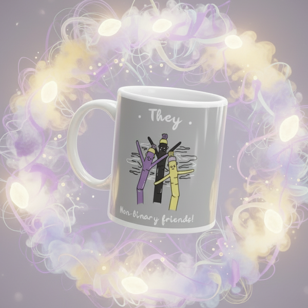 Angled gray mug reading “They” and “Non-binary friends!” with three colorful figures