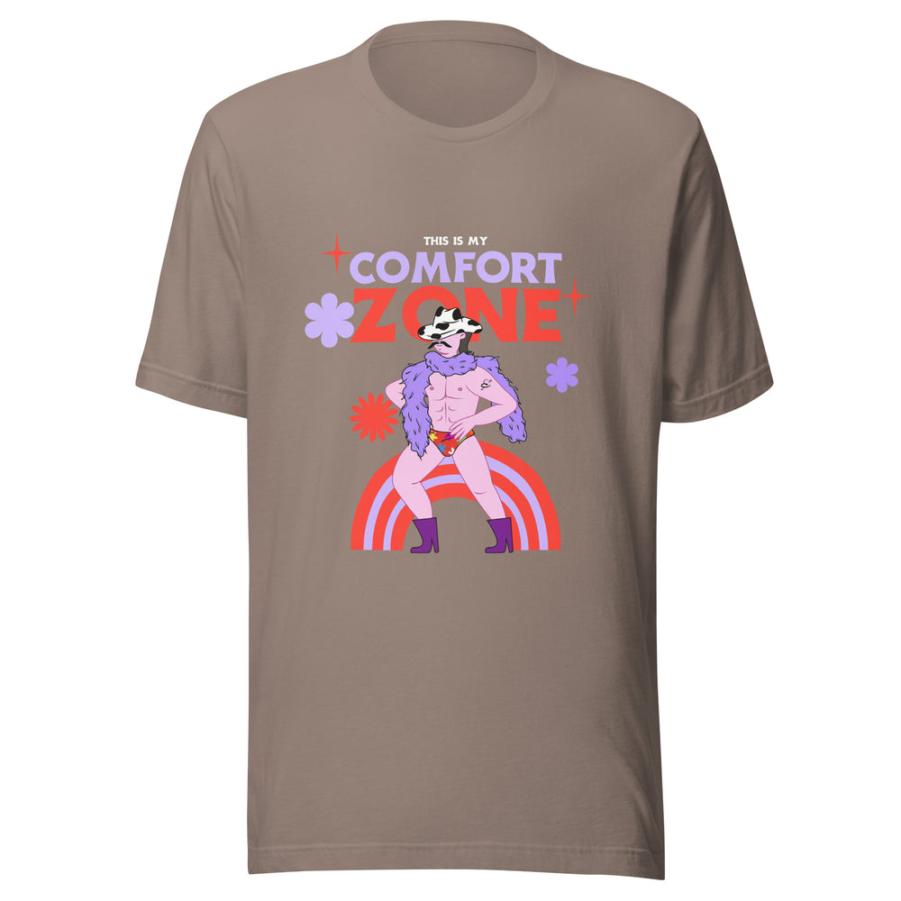 Front view of a brown T-shirt reading “THIS IS MY COMFORT ZONE,” with a cartoon figure and rainbow