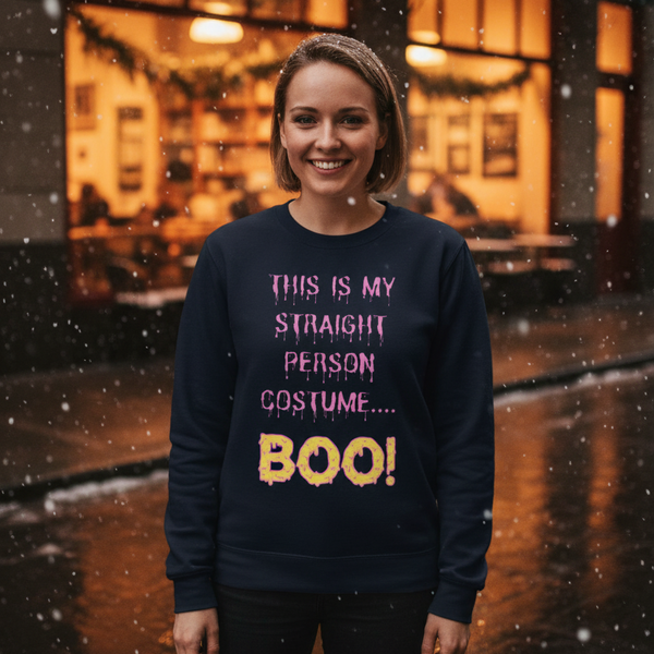 Smiling person wearing a dark sweatshirt reading “This Is My Straight Person Costume... Boo!”