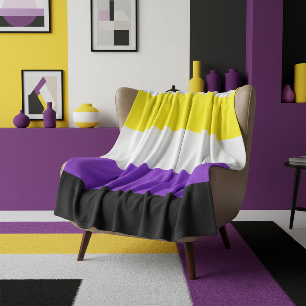Non-Binary Throw Blanket with yellow, white, purple, and black stripes drapes over a chair in a modern queer-chic room.