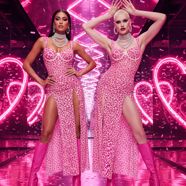 Two models in pink leopard-print lace dresses with thigh-high slits and boots