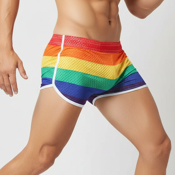Tight Rainbow Pride Shorts with horizontal rainbow stripes and white trim, modeled against a white background