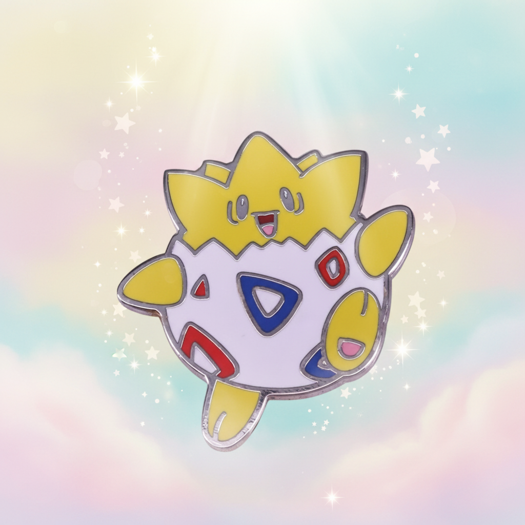 Togepi Enamel Pin against a dreamy sky, embodying pride and empowerment. This hard enamel pin celebrates LGBTQIA+ identity, perfect for expressing fierce self-expression and visibility.