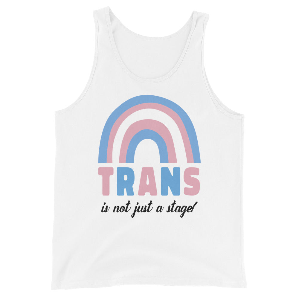 Front view of a white tank top with a pastel rainbow and “TRANS is not just a stage!”