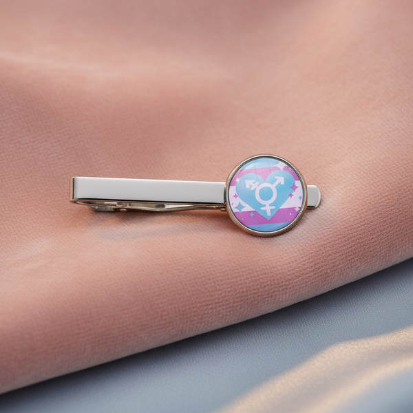 Transgender Love Tie Clip in shiny silver metal, featuring a round end with trans flag stripes and white trans symbol