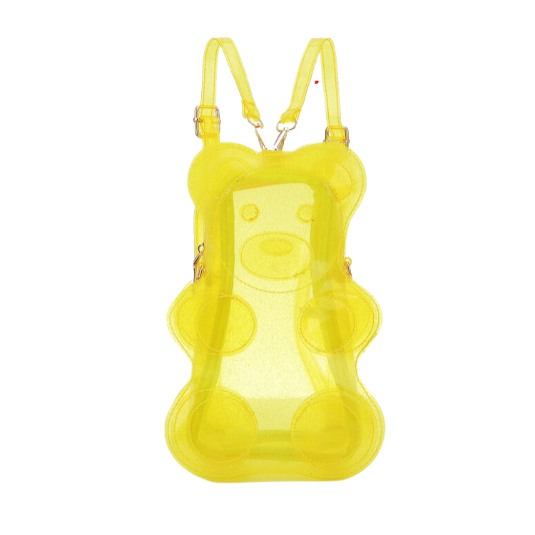 Front view of a translucent yellow glitter bear-shaped backpack with adjustable straps