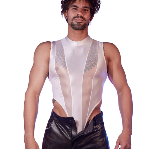 Front-facing person wearing a sheer white mesh bodysuit over black leather pants