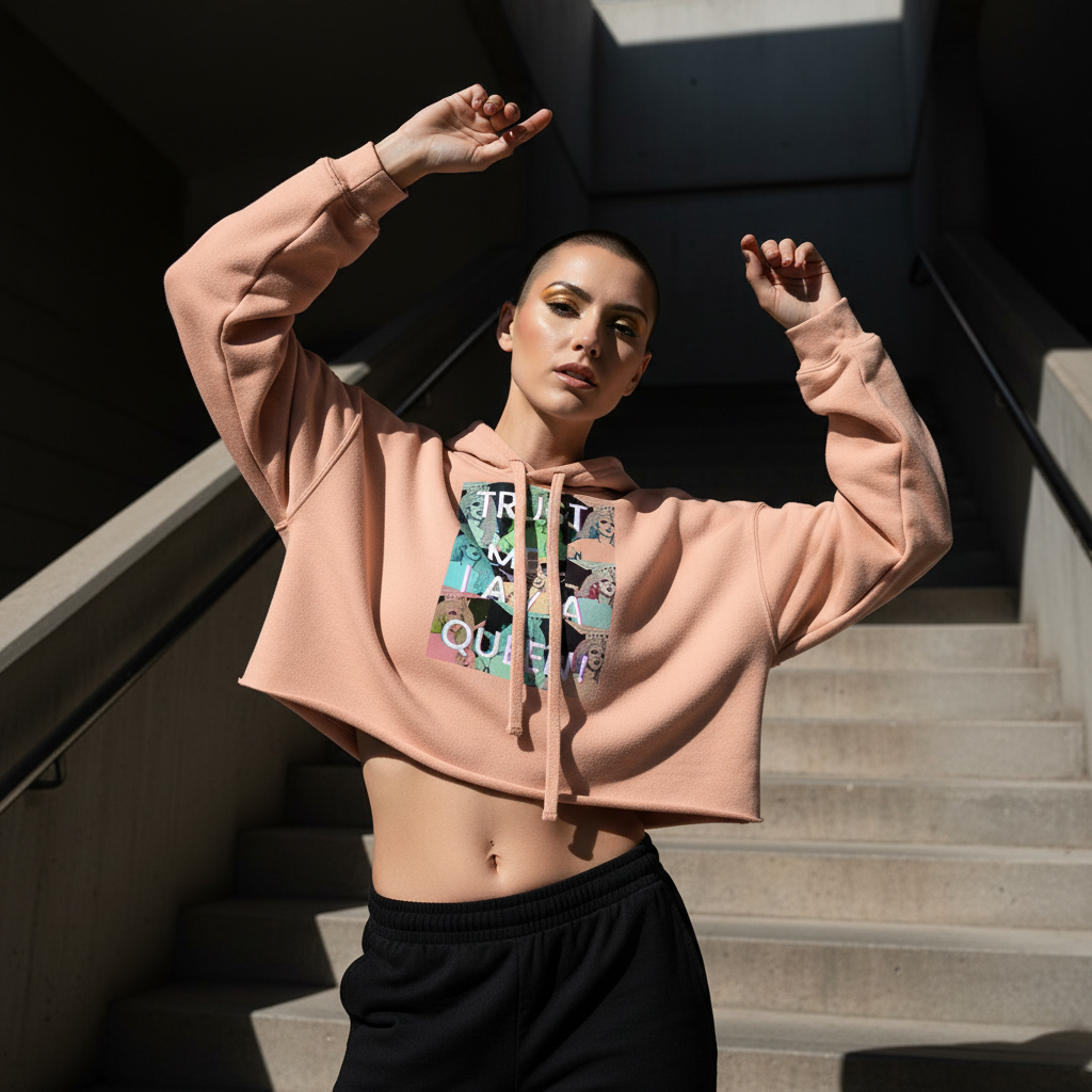Peach "Trust Me I'm A Queen" crop hoodie with bold graphic, black pants