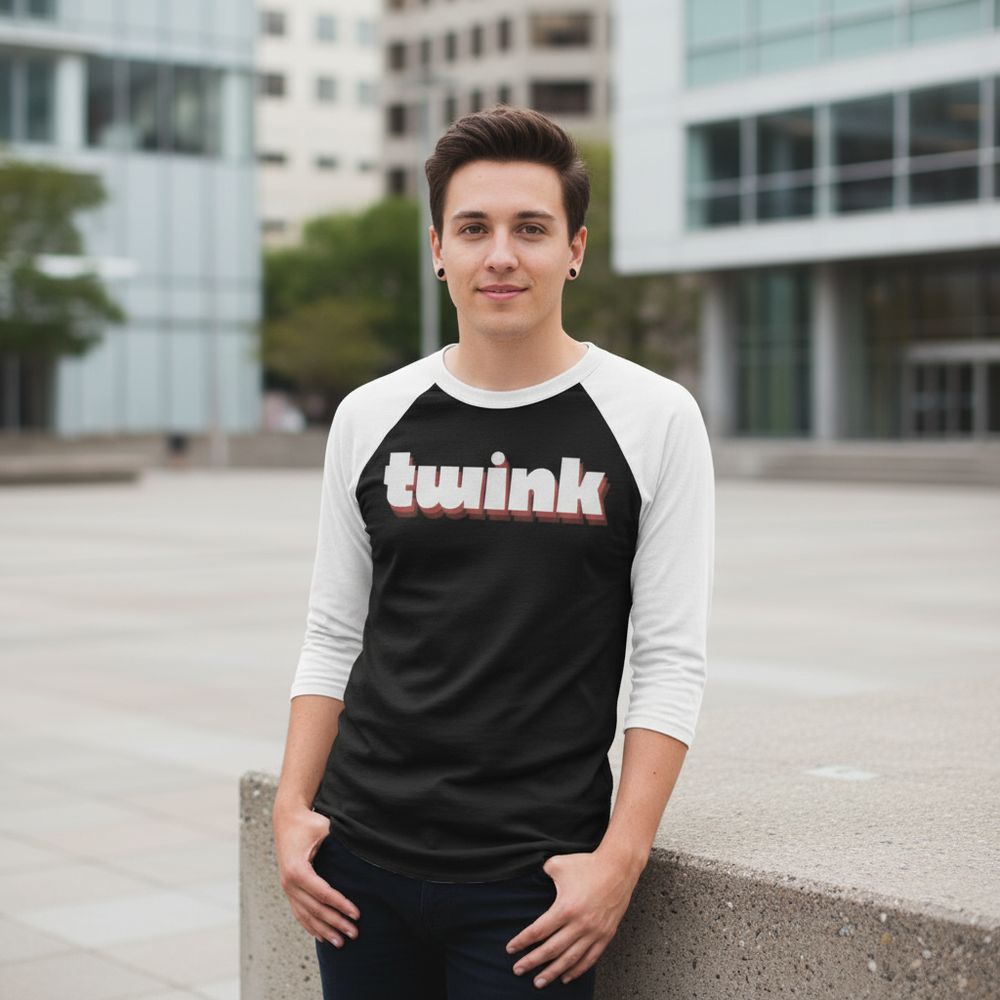 Person modeling a black-and-white raglan shirt with “twink” lettering outdoors