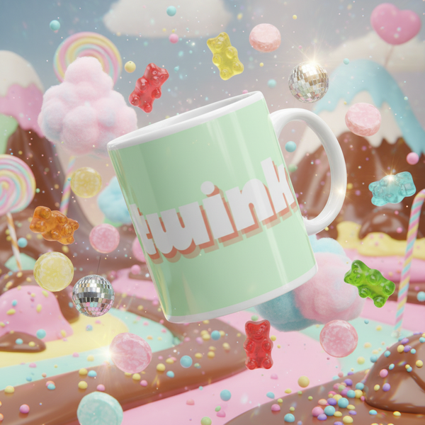 Angled pastel-mint mug with large white “twink” lettering, surrounded by candy and disco balls