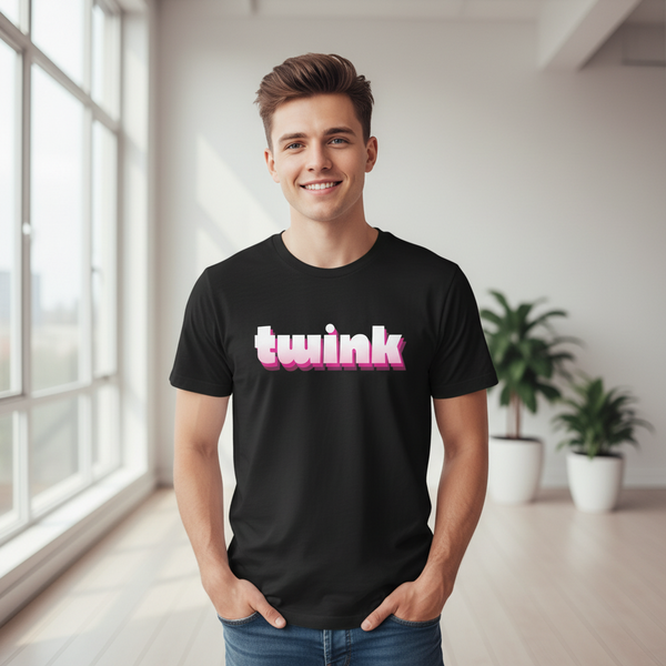 Black unisex LGBT t-shirt with “twink” in bold pink and white, worn by a smiling person in a bright plant-filled room