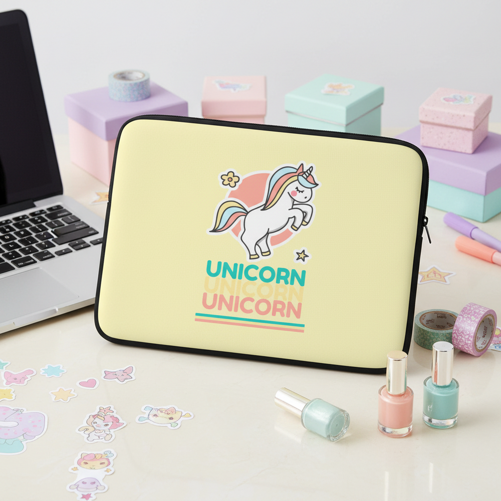 Yellow water-resistant laptop sleeve with “UNICORN” in blue, coral, yellow and a unicorn graphic