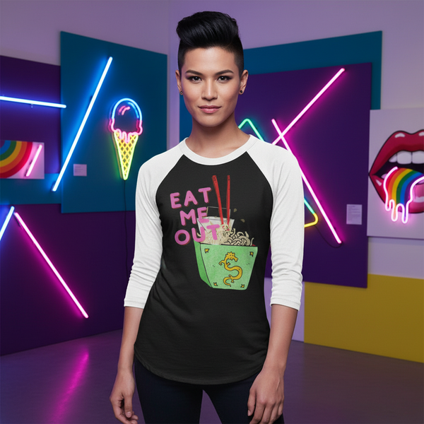 Eat Me Out 3/4 Sleeve Raglan Shirt in black and white, bold “EAT ME OUT” text, noodles and chopsticks; queer pop art vibes.