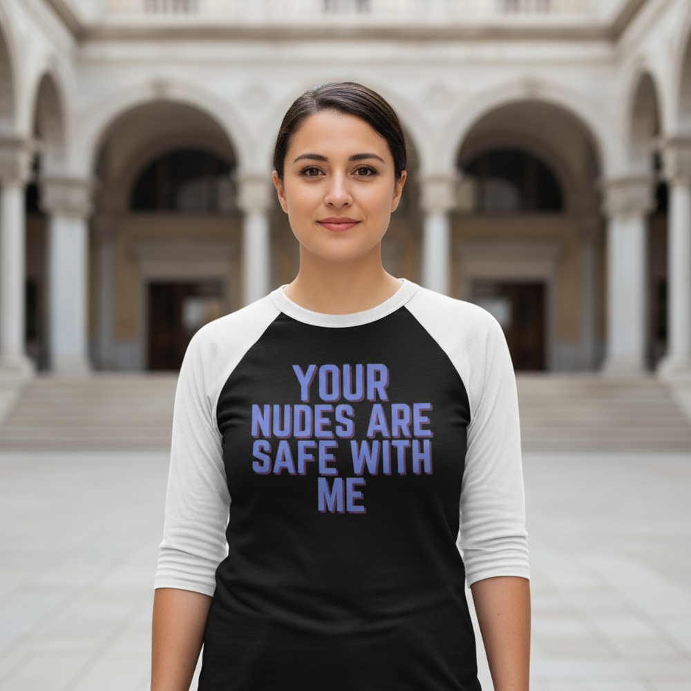 Front-facing person wearing a black-and-white raglan shirt reading “YOUR NUDES ARE SAFE WITH ME”
