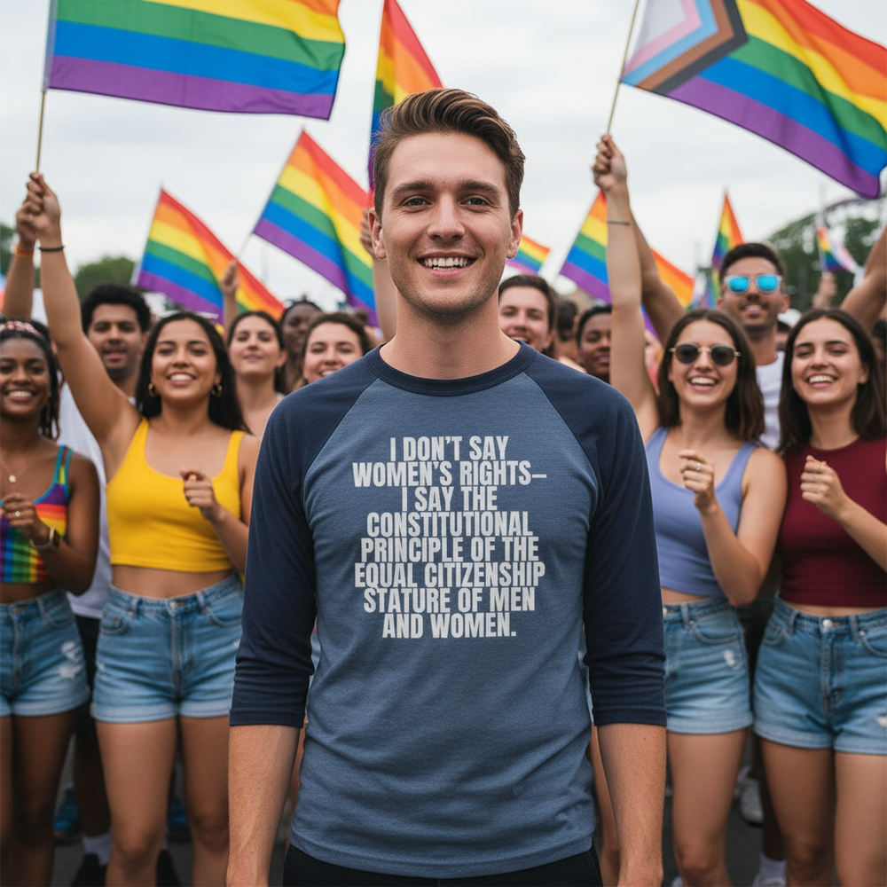 3/4 sleeve raglan shirt with “I don’t say women’s rights—say equal citizenship” at a queer pride parade with rainbow flags.