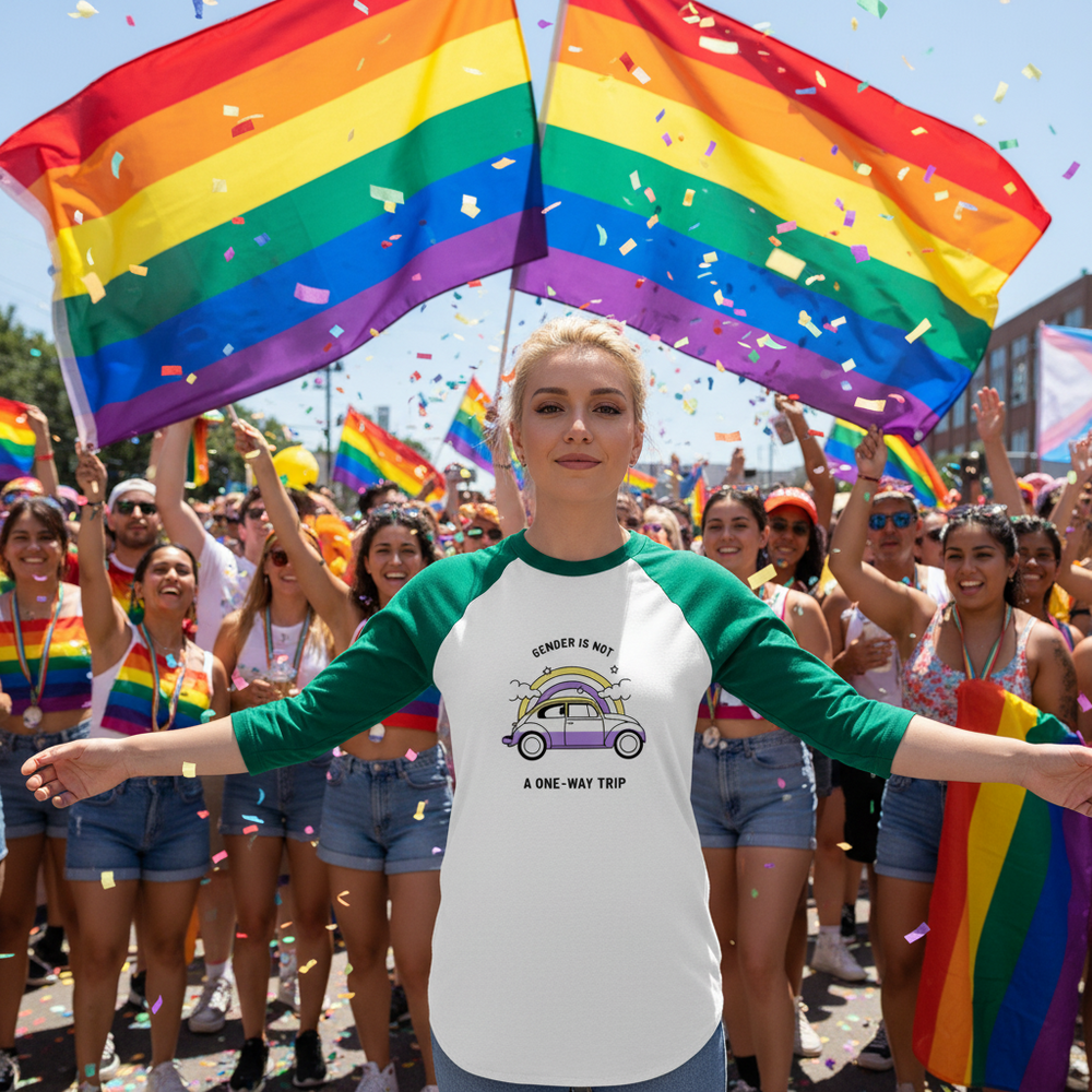 3/4 sleeve raglan shirt reading "Gender Is Not A One-Way Trip," worn at a pride parade, rainbow flags and confetti flying.