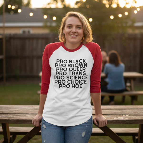 Pro Hoe 3/4 sleeve raglan shirt with bold “PRO BLACK PRO BROWN PRO QUEER PRO TRANS PRO SCIENCE PRO CHOICE PRO HOE.”.