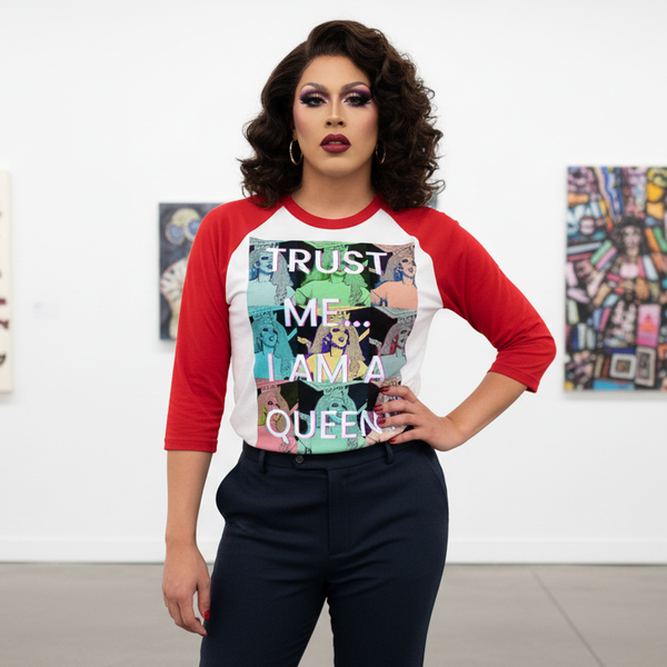 Model wearing a red-and-white raglan shirt reading “TRUST ME... I AM A QUEEN”