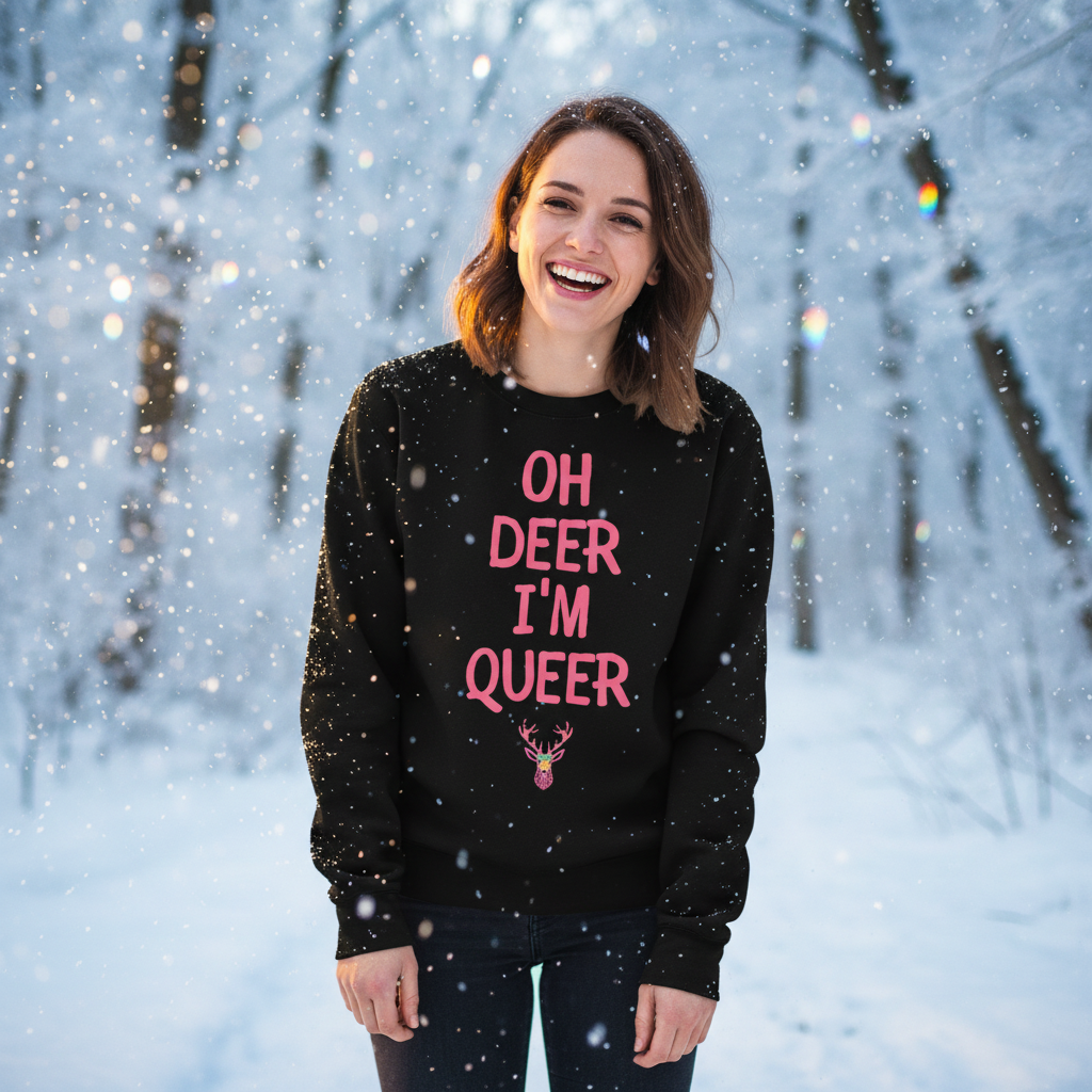 A person in a snowy forest proudly wears Oh Deer I'm Queer sweatshirt, embodying bold queer pride with pink text and a deer graphic.
